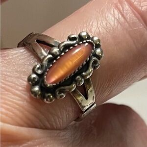 Signed Wheeler Manufacturing Sterling Silver Saw Tooth Set Orange Pua Shell Ring